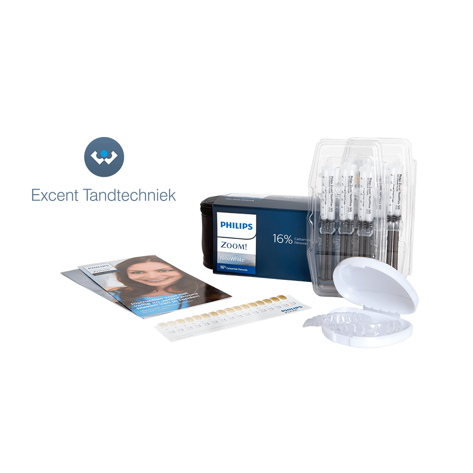 Patient applying whitening gel to customized tray