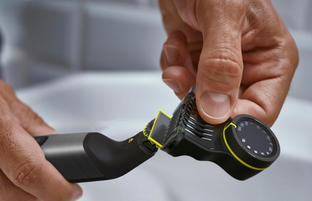 Een kam met 14 lengte-instellingen wordt bevestigd aan het mes van de OneBlade.